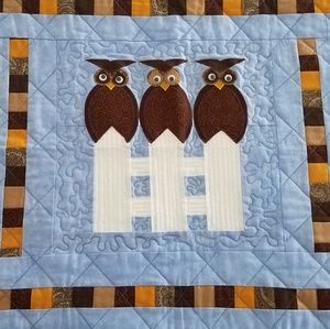 Owls on fence applique wall hanging